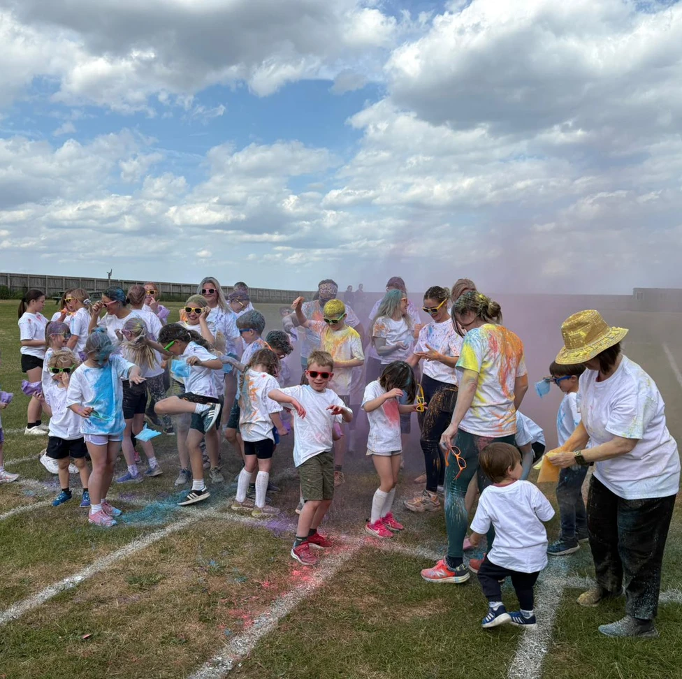 Children and parents at colour mile