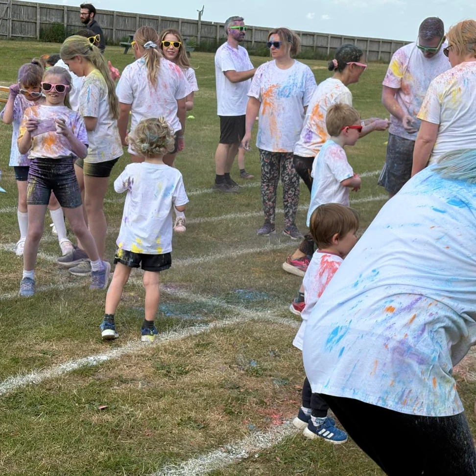 Children and parents at colour mile